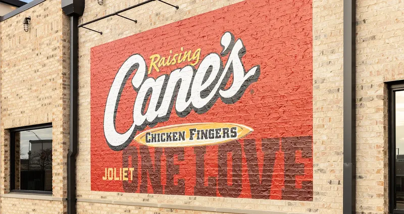 brand graphics installed in a brick wall